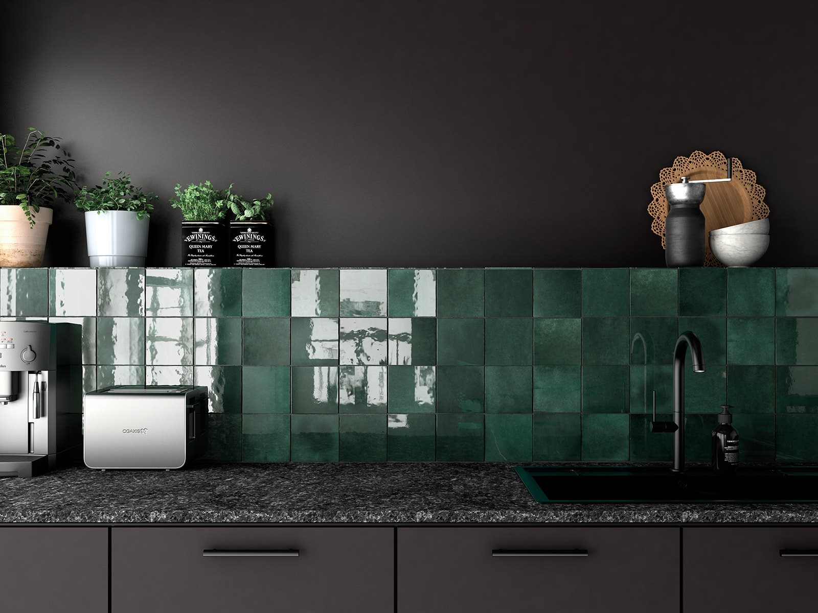 Zellige vert émeraude brillant 15x15 cm dans une cuisine moderne avec plans noirs et accessoires marron et métalliques