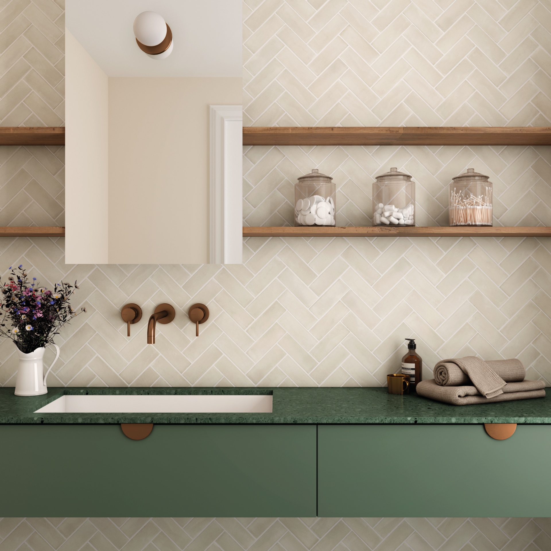 Zellige beige posé en chevron 5X15 dans une salle de bain tons crème et vert étagères en bois vasque moderne accessoires décoratifs