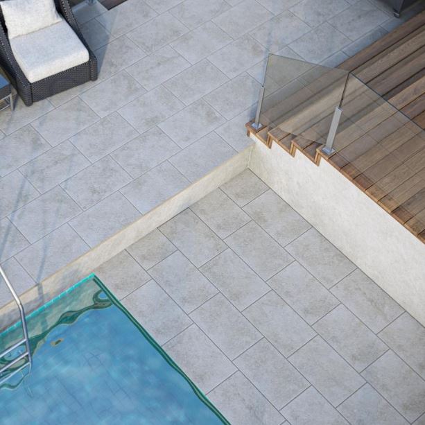 Carrelage de piscine moderne en imitation pierre grise
